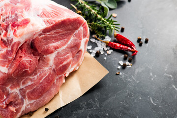 Raw Pork meat fillet. Pork meat, piece of meat close up. Prime filet meat texture. Chilled pork Boston butt, collar, shoulder. Steak. Raw pork neck, Spices. 