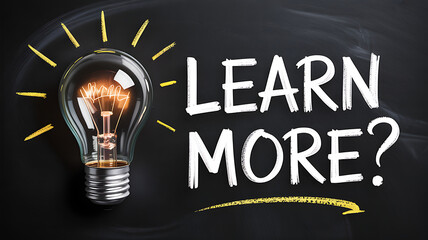 A lightbulb with rays and learn more text on a chalkboard style background
