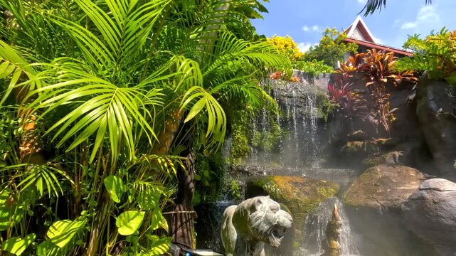 Beautiful water falls and garden at Wat Saket Ratchawora Mahawihan temple in Bangkok, Thailand.