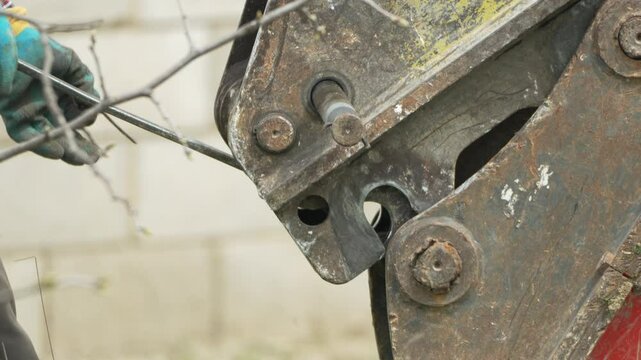 Machinery rusty metal joint detail on old heavy equipment outdoors