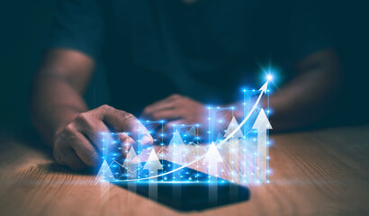 Business analytics and financial concept, Businessman using smartphone to analyze graph for investment, corporate future growth plan, Digital marketing, business planning and strategy.