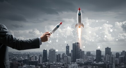 Hand Launching Rockets for Business Success Above Cityscape Photo