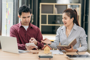 Real estate agents show clients home plans in a conference room. Buyers sign business contracts in a home office and discuss saving money on renting, buying a mortgage or home insurance.