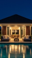 Photograph of Night Villa Exterior View with Pool and Lights