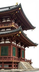 Photo of Traditional Japanese Temple Building with Red and Gold Detail