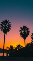 Silhouette of Palm Trees at Vibrant Sunset Tropical Scene