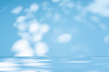 Wall interior background, studio and backdrops show products. with soft light shadow from window color blue and white. background for text insertion and presentation of product	