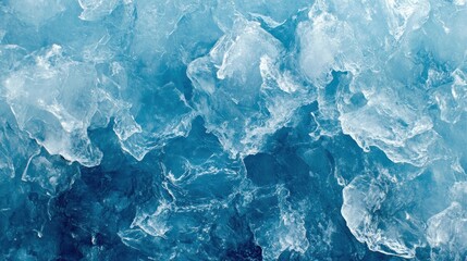 Obraz premium Close-up view of a textured surface of crushed ice, exhibiting various shades of blue and white.