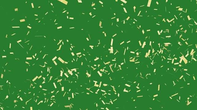 Gold confetti against green screen. Falling metallic paper with chroma key background.