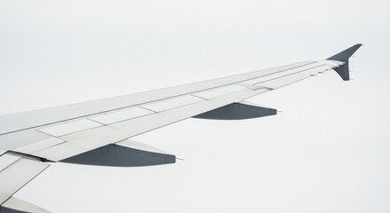Airplane wing detail seen from inside the aircraft