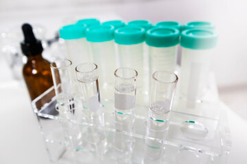 A set of clear tubes used in scientific and medical experiments.