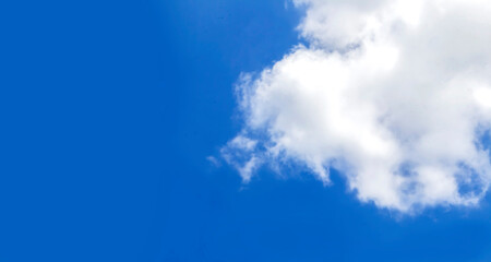 Blue sky and large clouds on a clear day