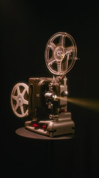 Bolex M8 Vintage Projector With Bright Lens Light In A Dark Interior