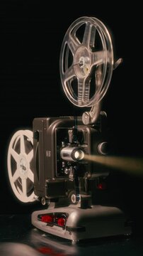 Classic Movie Projection With Bolex M8 In A Dimly Lit Room