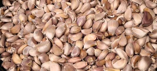 Fresh garlic in the store. Garlic for background.