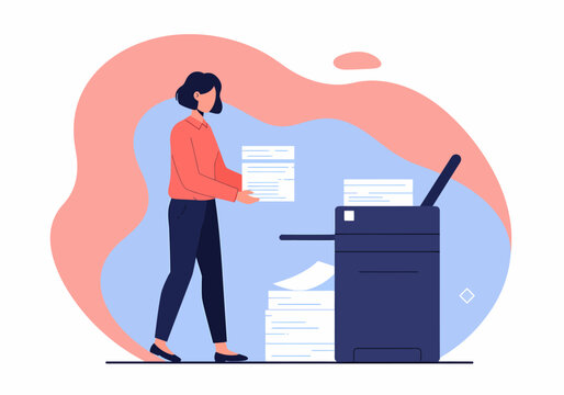 Female employee using printer or photocopier for documents