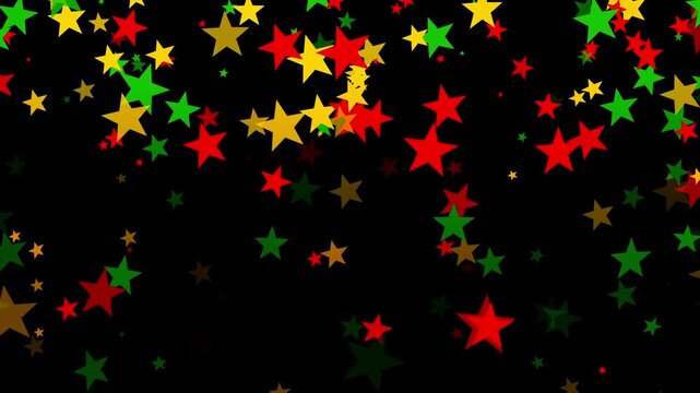 Stars falling in bold red, yellow, and green colors on black background for Juneteenth, or Freedom Day, to commemorate the ending of slavery on June 19th 1865 in the United States of America.