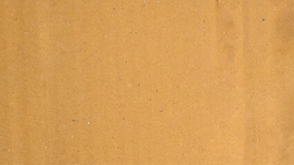 Background of brown kraft paper or cardboard texture. Brown recycled paper texture background.