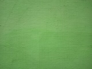 Vibrant Textured Green Painted Wall Surface Background