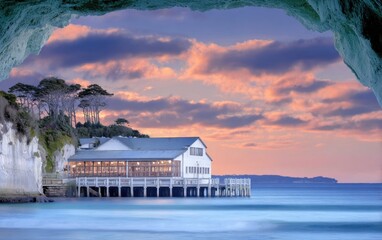 Coastal sunrise view from cave