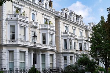 Typical white stucco residential buildings in Notting Hill area of London