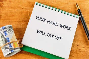 Concept of building success foundation. Text YOUR HARD WORK WILL PAY OFF