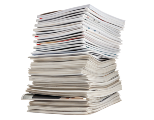 A stack of magazines or newspapers piled high on top of each other against a black background space filling