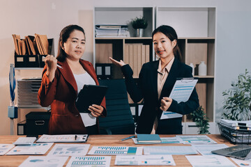 Business meeting time. Business man and business woman working on startup project.