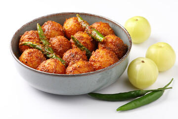 Homemade Amla and Green Chilli Pickle Preparation in Indian Kitchen
Amla Pickle or gooseberry pickle It is a spicy condiment made with Amla also known as Indian gooseberries,