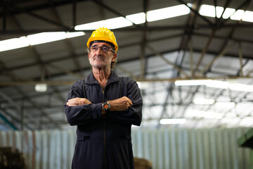 Portrait engineering man : Manufacture technical and factory senior caucasian staff standing  at industry factory. Professional Mechanical Engineer