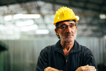 Portrait engineering man : Manufacture technical and factory senior caucasian staff standing  at industry factory. Professional Mechanical Engineer