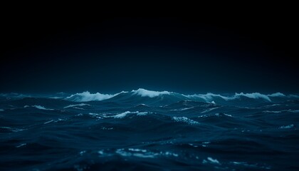 Moody ocean waves cresting under a dark, ominous sky evoke a sense of power and mystery.