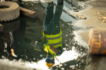 teamwork : Officials from the Department of Hazardous substances control bureau is investigating the leak of a hazardous chemical in chemical industry plant. Man with safety protective mask in factory