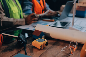 Engineers are helping to design work on blueprints and collaborate on structural analyzing of project types.