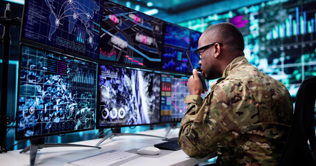 Army Soldier Controls CCTV Camera Screen