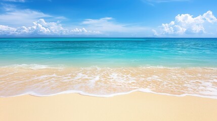 Obraz premium Seascape with gradient of blue ocean waters meeting golden sandy beach