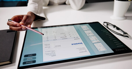 Digital African American Accountant Calculating Invoice