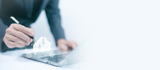 Businessmen use computers to visualize large online data in the cloud. It is a cloud server backup...