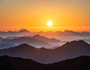 Obraz premium Sunrise over layered mountain ranges