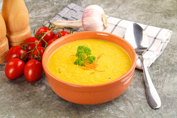Vegetarian corn cream soup served parsley