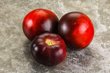Black ripe juicy organic tomato