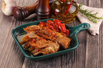 Baked lamb ribs with vegetables