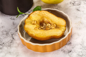 Baked quince with honey and cedar