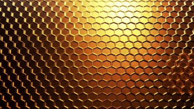 Golden honeycomb pattern with shiny metallic hexagon cells creating warm reflective texture and abstract background evoking luxury and intricate golden design