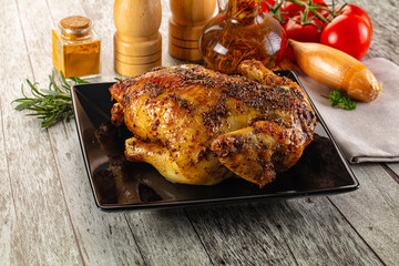 Baked in oven whole chicken with spices