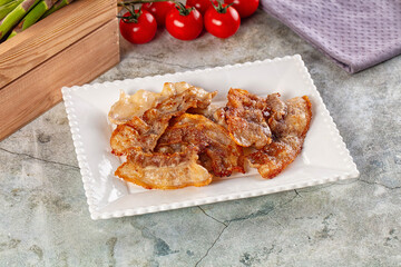 Fried crispy pork bacon snack