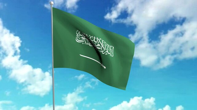 National flag of the kingdom of saudi arabia. fluttering against the background of a slightly cloudy blue sky.