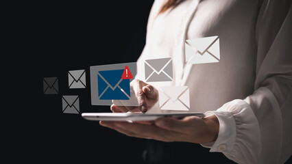 Phishing email alert concept with person using smartphone while surrounded by warning icons...