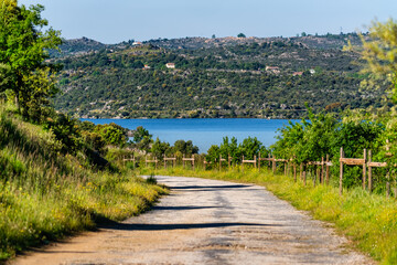 A path that leads to the Atazar reservoir between the mountains of Guadarrama, Madrid.