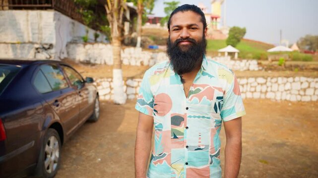 Bearded man introduces himself along rural trail